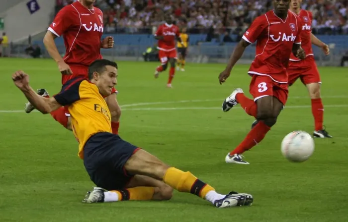 Framed Print : Robin van Persie's Debut: Arsenal's 2-0 Victory Over FC Twente in Champions League Qualifier