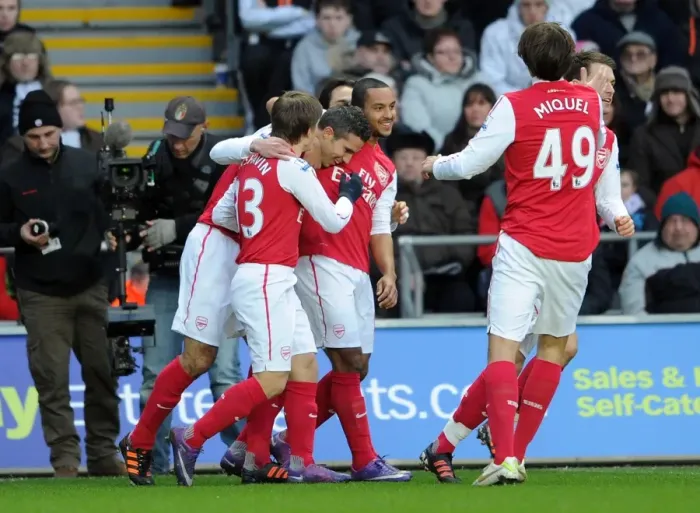 Framed Print : Robin van Persie's Goal Celebration: Swansea City vs. Arsenal (2011-12) Framed Print : Robin van Persie's Goal Celebration: Swansea City vs. Arsenal (2011-12)