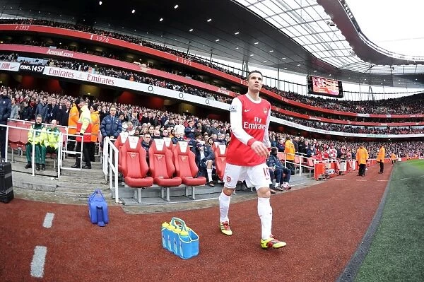 Robin van Persie's Hat-Trick: Arsenal's Dominant 3-0 Win Over Wigan Athletic in the Premier League