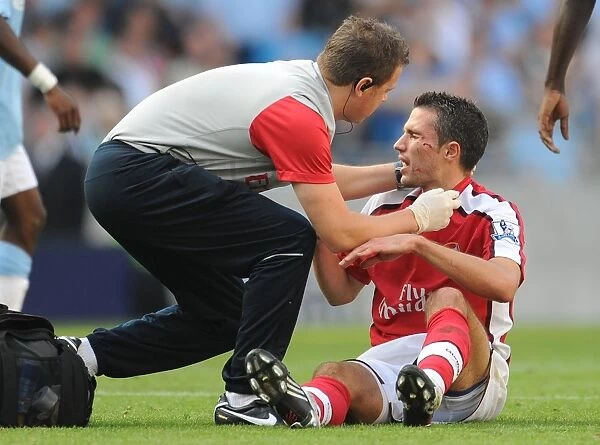 Robin van Persie's Injury: Adebayor's Kick Marrs Arsenal's Victory, Manchester City vs. Arsenal, 2009