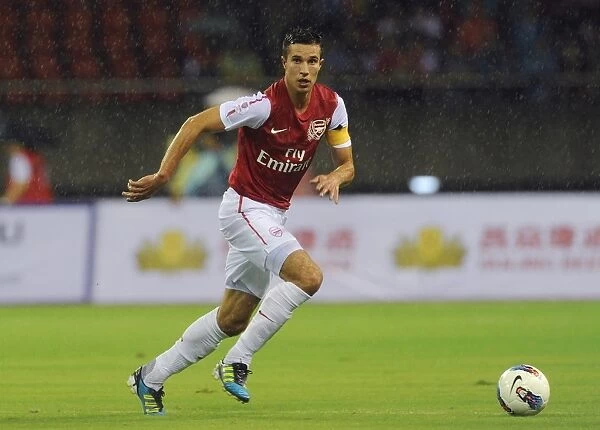 Robin van Persie's Pre-Season Glory: Arsenal Star's Brilliant Performance against Hangzhou Greentown, China (2011)