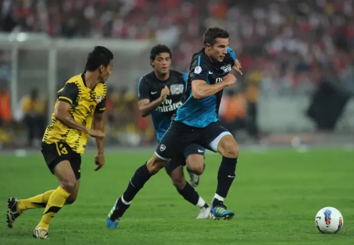 Framed Print : Robin van Persie's Stellar Show: Arsenal Thrashes Malaysia XI 4-0