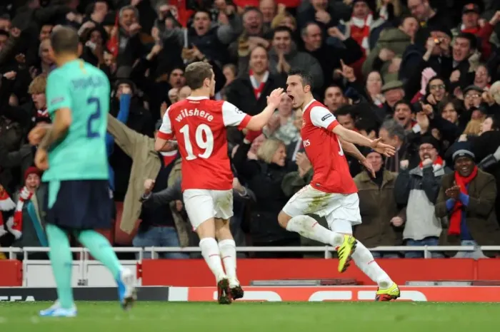 Framed Print : Robin van Persie's Thrilling Goal: Arsenal Takes the Lead Against Barcelona in Champions League