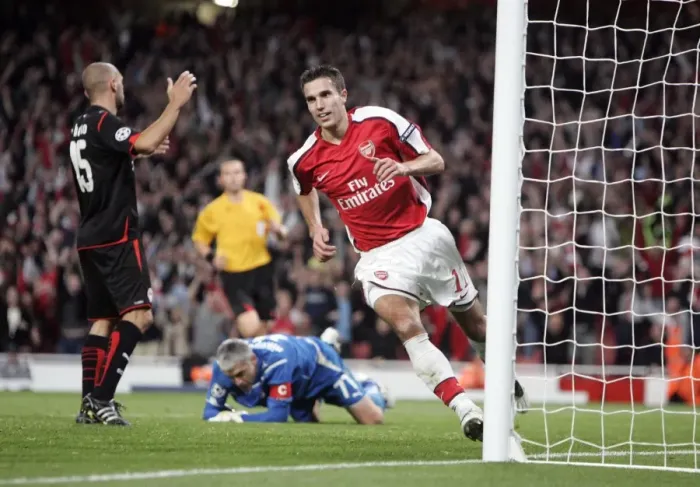 Framed Print : Robin van Persie's Thrilling Goal: Arsenal's 2-0 Lead in Champions League vs. Olympiacos