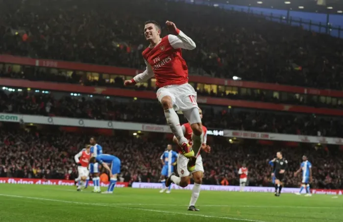 Framed Print : Robin van Persie's Triumph: Arsenal's 3rd Goal vs Wigan Athletic in the Premier League