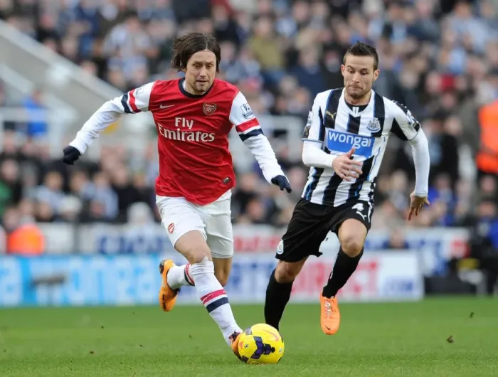 Framed Print : Rosicky vs Cabaye: Intense Battle in Newcastle United vs Arsenal, Premier League 2013-14