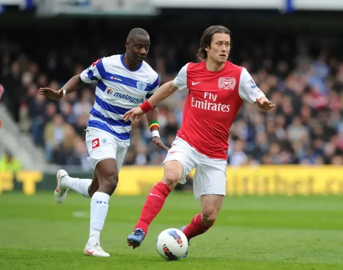 Framed Print : Rosicky vs. Diakite: Intense Battle in Queens Park Rangers vs. Arsenal Football Match, Premier League, 2012
