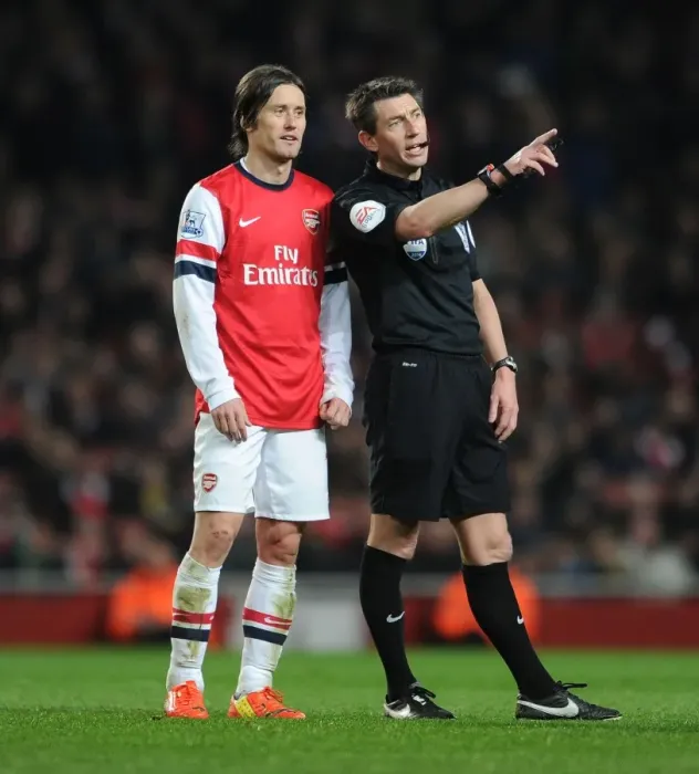 Framed Print : Rosicky vs. Probert: A Moment of Dispute during Arsenal vs. Swansea City (2013-14)