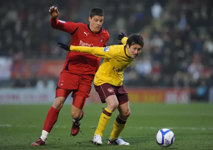 Framed Print : Rosicky vs. Revell: FA Cup Battle at Leyton Orient