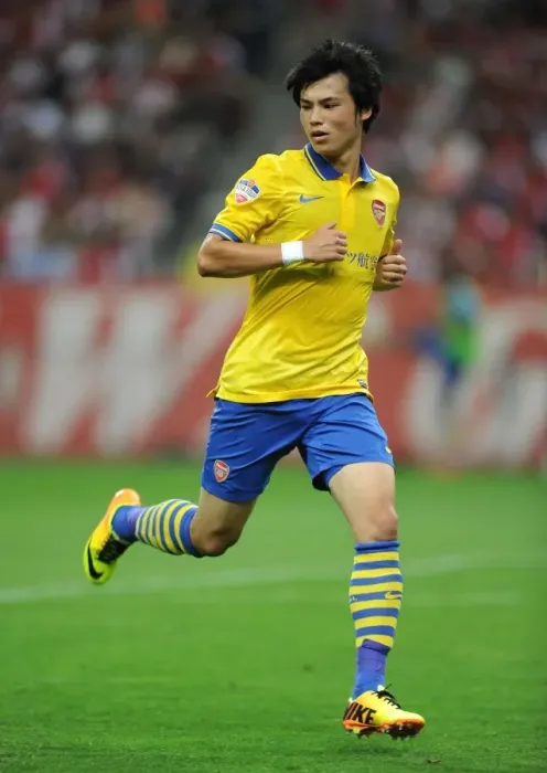 Framed Print : Ryo Miyaichi: Arsenal's Star Player Shines in Urawa Red Diamonds Friendly Match, 2013