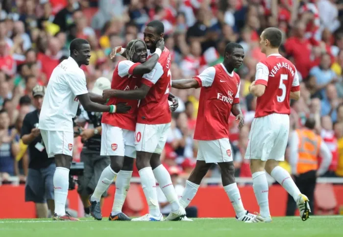 Framed Print : Sagna, Djourou, and Eboue: Arsenal's Unforgettable Celebration of a Pre-Season Double Strike Against Celtic