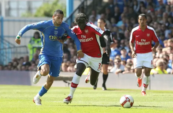 Framed Print : Sagna's Double Domination: Arsenal's 4-0 Triumph Over Portsmouth, 2009