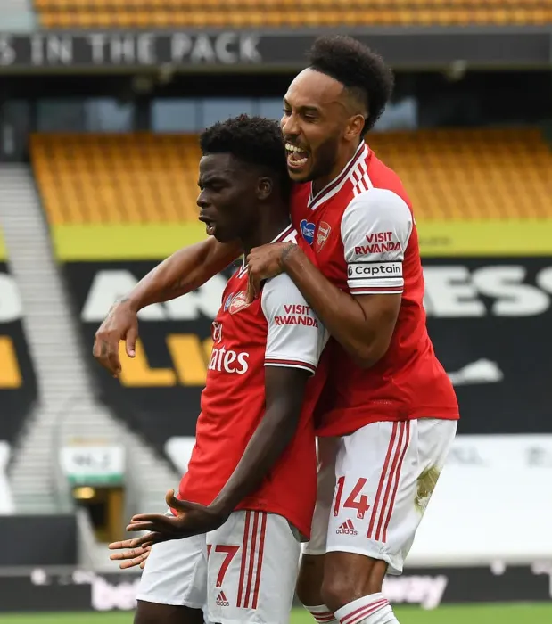 Framed Print : Saka and Aubameyang Celebrate Arsenal's First Goal Against Wolverhampton Wanderers (2019-20)