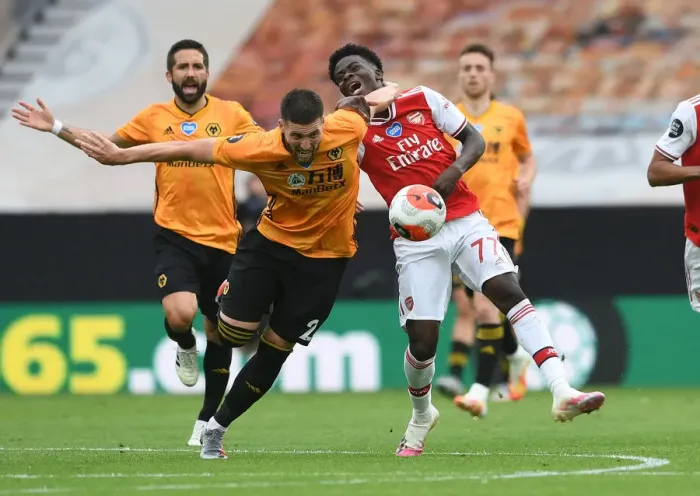 Framed Print : Saka Foul: Wolverhampton Wanderers vs. Arsenal FC, Premier League 2019-2020 Framed Print : Saka Foul: Wolverhampton Wanderers vs. Arsenal FC, Premier League 2019-2020