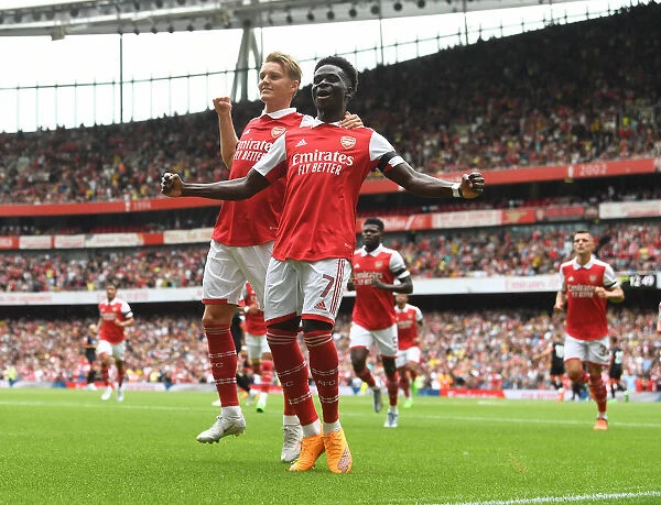 Saka and Odegaard Celebrate First Goals: Arsenal's Win Against Sevilla in Emirates Cup