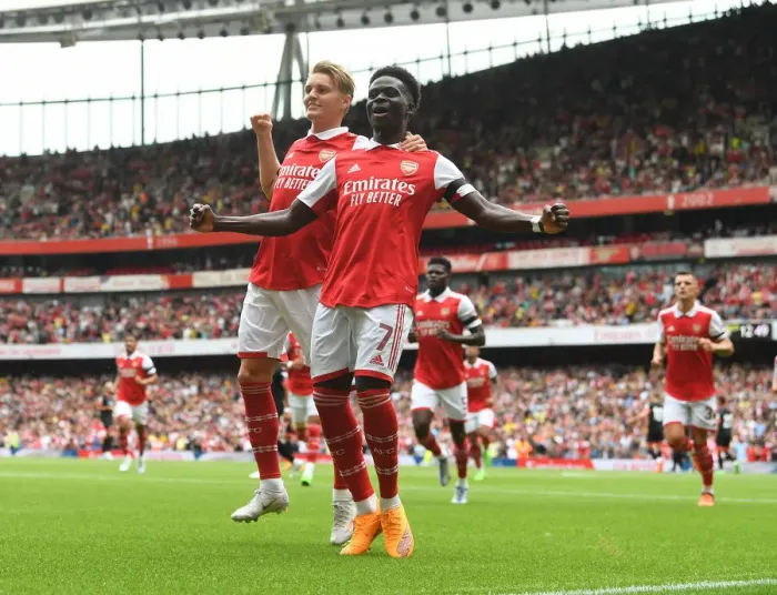 Framed Print : Saka and Odegaard Celebrate First Goals: Arsenal's Win Against Sevilla in Emirates Cup
