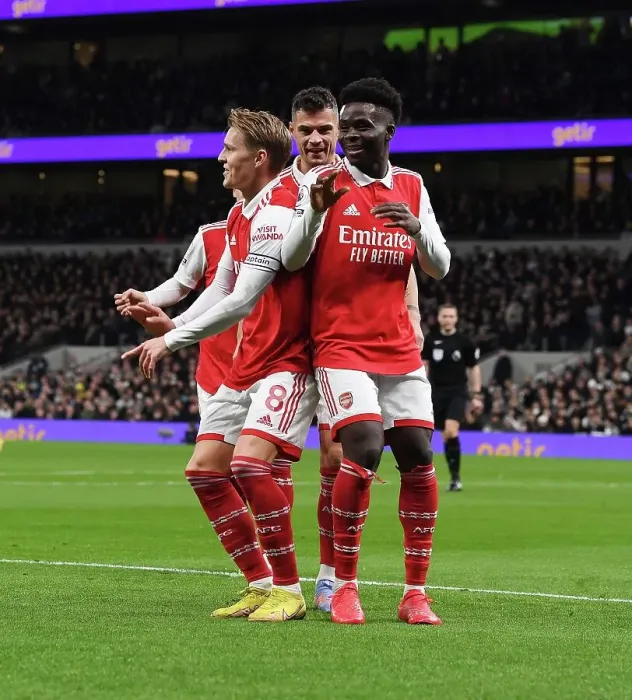 Framed Print : Saka, Odegaard, Xhaka: Arsenal's Triumphant Start to 2023 with Goal Celebration vs. Tottenham