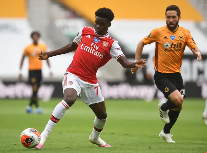 Framed Print : Saka Under Pressure: Wolverhampton Wanderers vs. Arsenal FC, Premier League 2019-2020