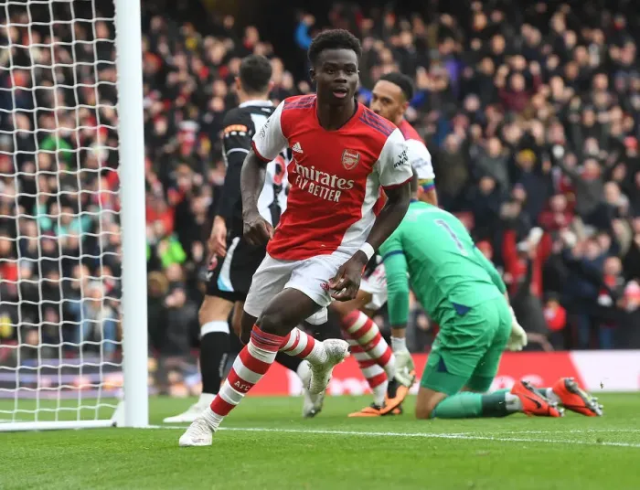 Framed Print : Saka Scores First: Arsenal's Triumph Over Newcastle United in the Premier League 2021-22