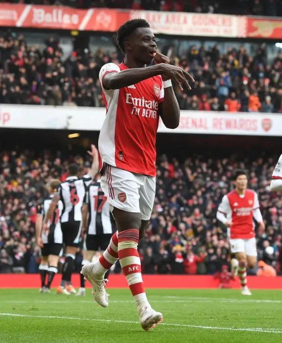 Framed Print : Saka Scores First: Arsenal's Victory over Newcastle United in Premier League Showdown