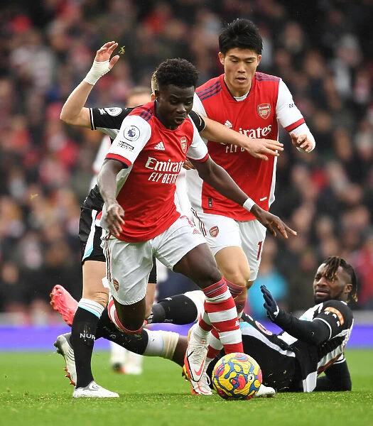 Saka Scores Spectacular Win: Arsenal's Star Outmaneuvers Saint-Maximin in Premier League Clash