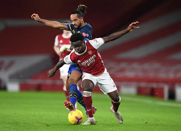 Saka Shines: Bukayo Outmaneuvers Walcott in Arsenal's Victory Over Southampton (2020-21)