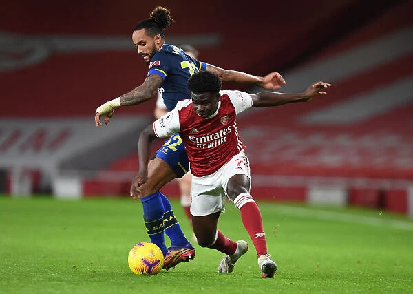 Saka Shines: Young Gun Bukayo Outperforms Walcott in Arsenal's Victory over Southampton (December 2020)