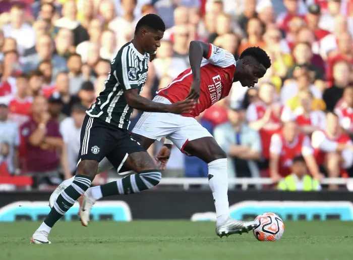 Framed Print : Saka Surges Past Rashford: Arsenal vs Manchester United, Premier League 2023-24