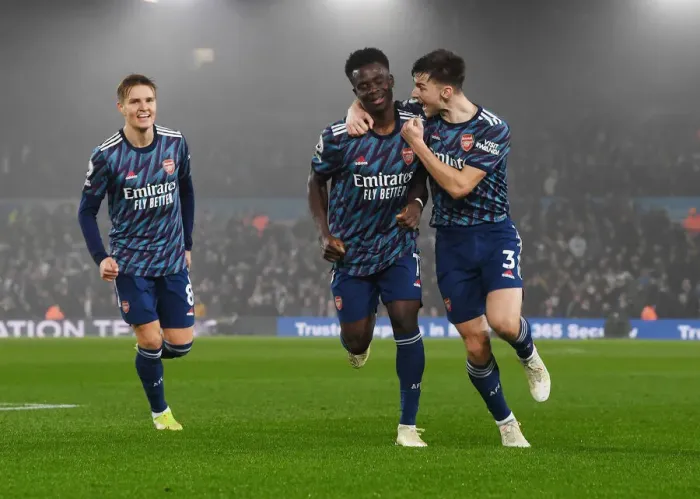 Framed Print : Saka and Tierney Celebrate Arsenal's Third Goal vs Leeds United (2021-22)