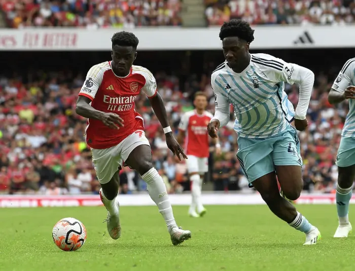 Framed Print : Saka vs. Aina: Intense Face-Off in Arsenal's 2023-24 Premier League Clash Against Nottingham Forest Framed Print : Saka vs. Aina: Intense Face-Off in Arsenal's 2023-24 Premier League Clash Against Nottingham Forest