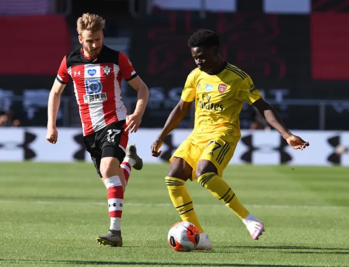 Framed Print : Saka vs. Armstrong: A Premier League Showdown at Southampton (2019-20)