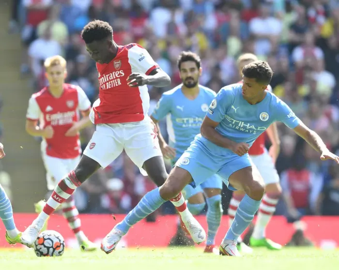 Framed Print : Saka vs Cancelo: A Premier League Showdown - Manchester City vs Arsenal (2021-22)