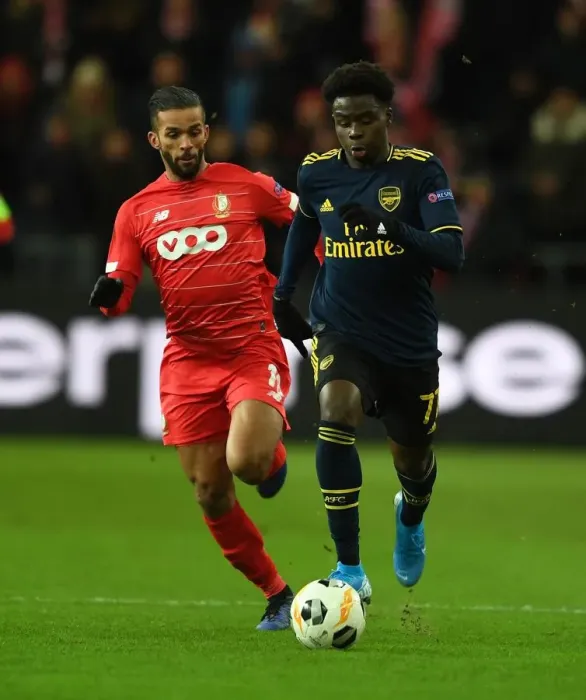Framed Print : Saka vs. Carcela: A Europa League Battle at Standard Liege Framed Print : Saka vs. Carcela: A Europa League Battle at Standard Liege