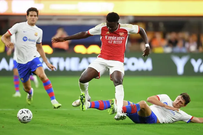 Framed Print : Saka vs. Christensen: Arsenal vs. FC Barcelona Clash in California Framed Print : Saka vs. Christensen: Arsenal vs. FC Barcelona Clash in California