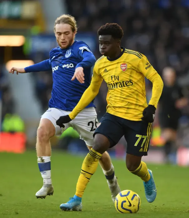 Framed Print : Saka vs. Davies: A Premier League Showdown - Arsenal vs. Everton (December 2019) Framed Print : Saka vs. Davies: A Premier League Showdown - Arsenal vs. Everton (December 2019)