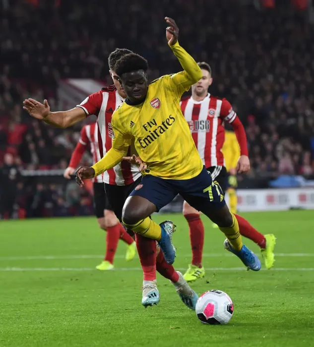 Framed Print : Saka vs Egan: A Battle at Bramall Lane - Sheffield United vs Arsenal, Premier League 2019-20