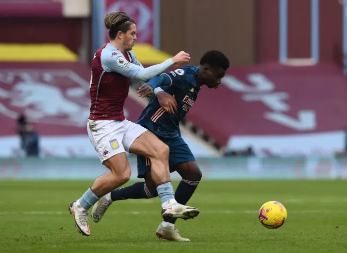 Framed Print : Saka vs Grealish: A Premier League Face-Off at Villa Park Framed Print : Saka vs Grealish: A Premier League Face-Off at Villa Park
