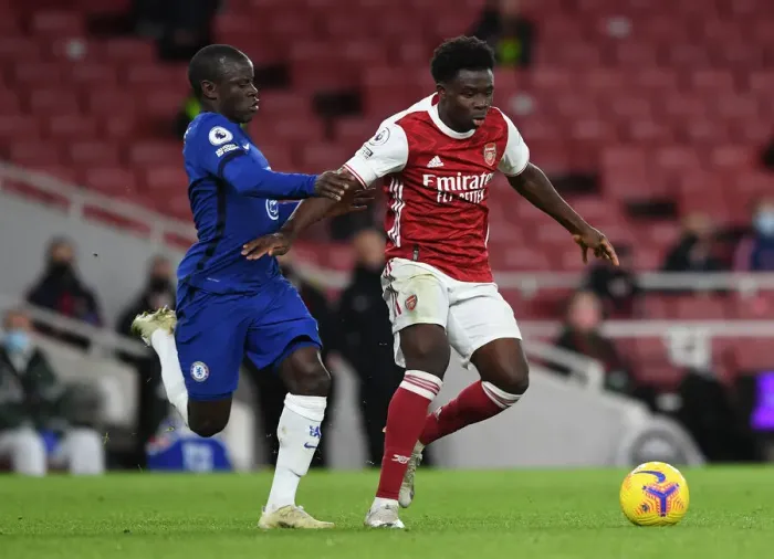 Framed Print : Saka vs. Kante: Intense Rivalry Unfolds in Arsenal vs. Chelsea Premier League Showdown Framed Print : Saka vs. Kante: Intense Rivalry Unfolds in Arsenal vs. Chelsea Premier League Showdown