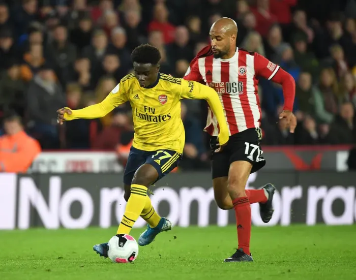 Framed Print : Saka vs McGoldrick: Battle at Bramall Lane - Sheffield United vs Arsenal, Premier League 2019-20 Framed Print : Saka vs McGoldrick: Battle at Bramall Lane - Sheffield United vs Arsenal, Premier League 2019-20