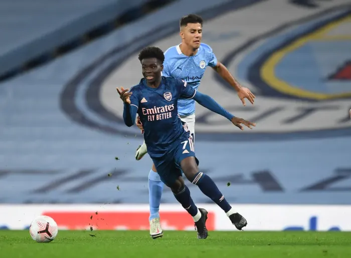 Framed Print : Saka vs Rodrigo: A Premier League Battle - Manchester City vs Arsenal (2020-21) Framed Print : Saka vs Rodrigo: A Premier League Battle - Manchester City vs Arsenal (2020-21)