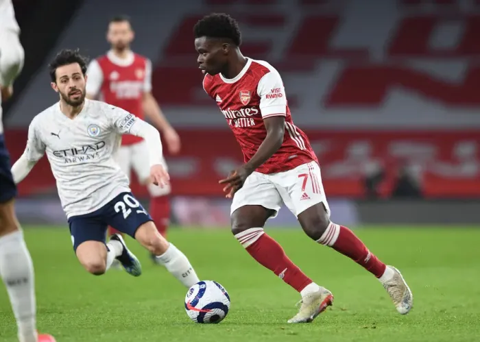 Framed Print : Saka vs Silva: Premier League Showdown at Empty Emirates Stadium - Arsenal vs Manchester City, 2021