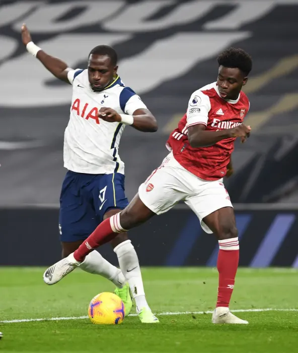 Framed Print : Saka vs. Sissoko: Battle in the Premier League - Arsenal vs. Tottenham (December 2020)