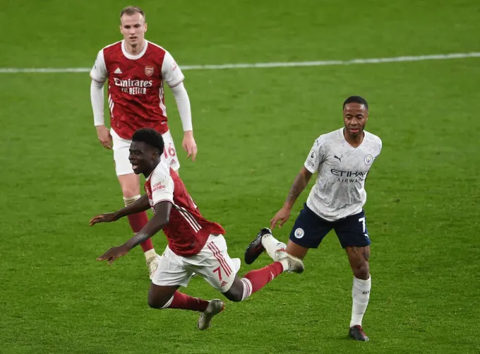 Framed Print : Saka vs Sterling: Empty Battle - Arsenal vs Manchester City, Premier League 2021
