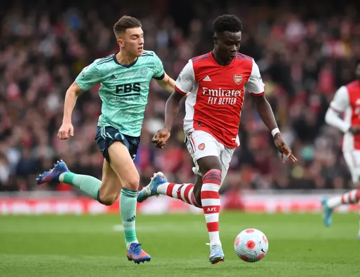 Framed Print : Saka vs. Thomas: Intense Head-to-Head Battle in Arsenal vs. Leicester Premier League Clash