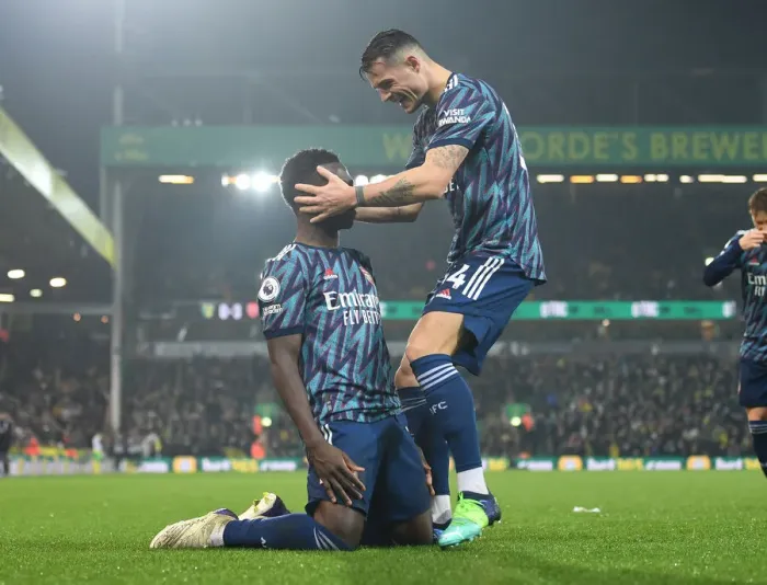Framed Print : Saka and Xhaka Celebrate Arsenal's Goals Against Norwich City (December 2021)