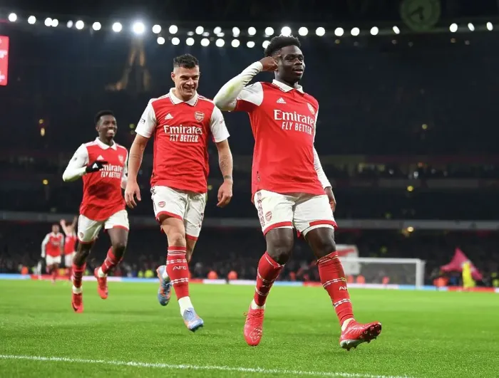 Framed Print : Saka's Brace: Arsenal Secures Premier League Victory Over Manchester United (2022-23)