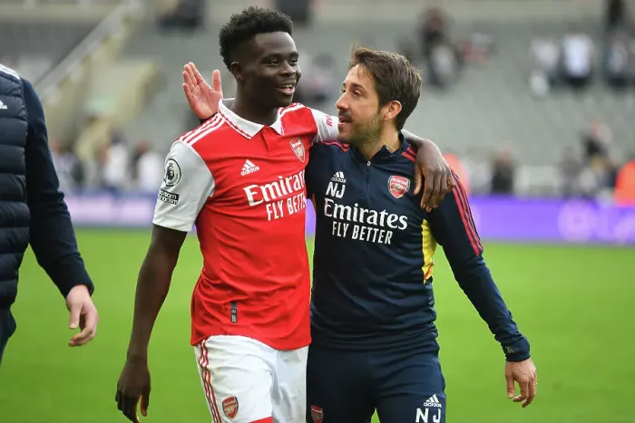 Framed Print : Saka's Celebration: Arsenal Secure Victory over Newcastle United in Premier League Thriller