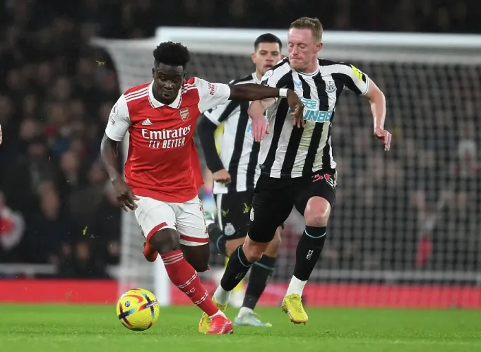 Framed Print : Saka's Skillful Run: Outsmarting Longstaff in Arsenal's Premier League Victory Framed Print : Saka's Skillful Run: Outsmarting Longstaff in Arsenal's Premier League Victory