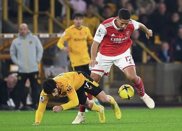Saliba vs. Guedes: A Defensive Battle in Wolverhampton Wanderers vs. Arsenal FC, 2022-23 Premier League
