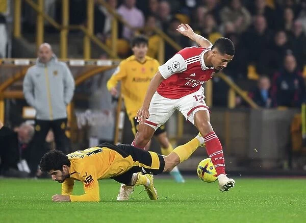 Saliba vs. Guedes: A Defensive Showdown in Wolverhampton Wanderers vs. Arsenal FC Premier League Clash, 2022-23